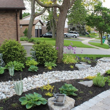 Front yard with no lawn and a lot of curb appeal