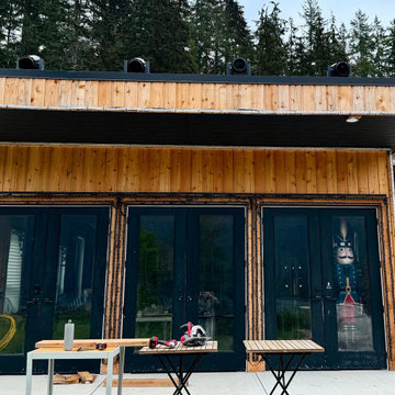Aging cedar (wood) siding with brand-new cedar plank