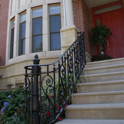 Solid stone stairs with ornamental iron railing - Products