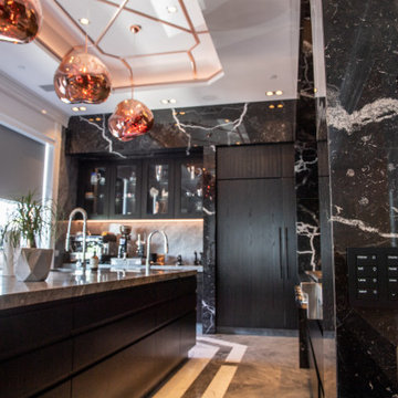 Kitchen area filled with natural light and smart home controls that blend with t