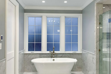Inspiration for a large master marble floor, white floor and single-sink bathroom remodel in DC Metro with a built-in vanity