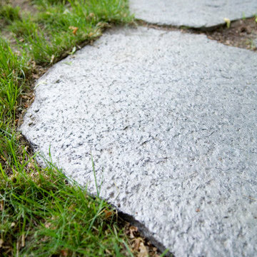 Mica-flecked natural stone to reflect light in the shade