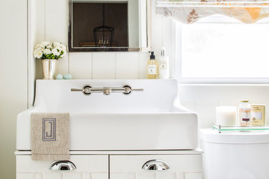 Example of a small mountain style kids' gray tile and marble tile mosaic tile floor and gray floor alcove bathtub design in Other with furniture-like cabinets, white cabinets, a one-piece toilet, white walls and a console sink