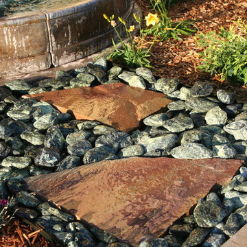 Colorful Fountain Garden with Rock Walkway