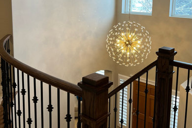 Large transitional staircase photo in Denver