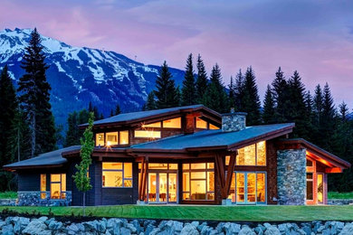 Mid-sized contemporary gray two-story mixed siding exterior home idea in Vancouver