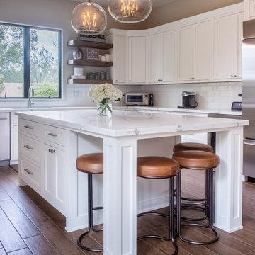 All-new white kitchen cabinetry and kitchen island