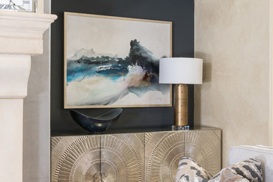 Mid-sized transitional enclosed medium tone wood floor living room photo in Other with beige walls, a standard fireplace and a wall-mounted tv