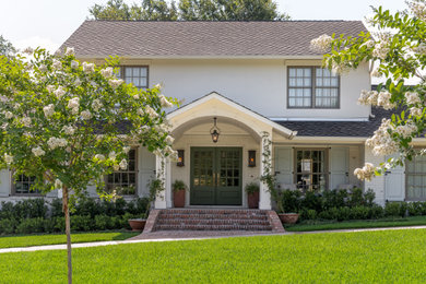 Transitional white two-story brick house exterior photo in Austin