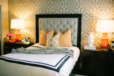 Small trendy guest dark wood floor bedroom photo in Orange County with gray walls and no fireplace