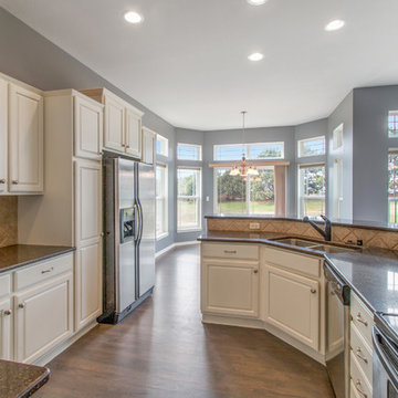 Bye, Bye Golden Oak.....Hello Painted Cabinets!