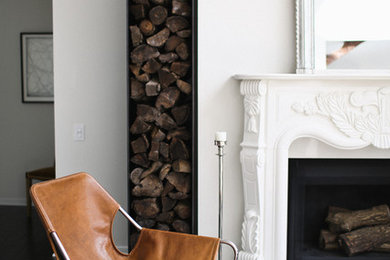 Transitional dark wood floor living room photo in San Francisco with white walls and a standard fireplace