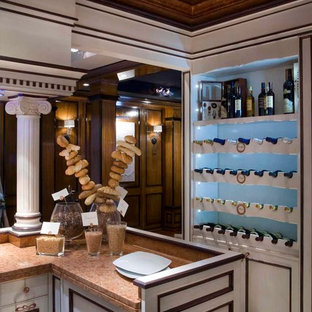 Large traditional kitchen pantry inspiration - Large elegant dark wood floor kitchen pantry photo in Milan with an island