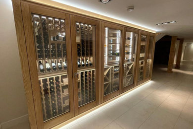 Design ideas for a small modern wine cellar in Essex.