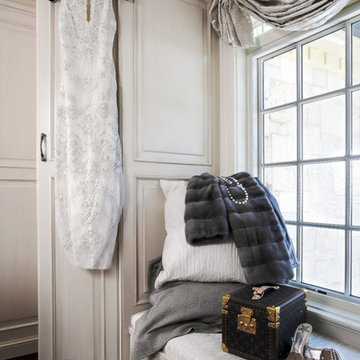 Custom Couture Master Closet in Winnetka with White Recessed Panel Cabinetry