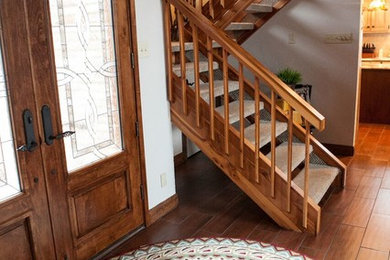 Inspiration for a mid-sized timeless l-shaped open staircase remodel in Austin