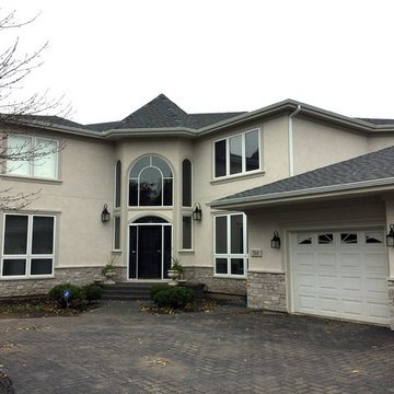 Dryvit into Stucco and Stone