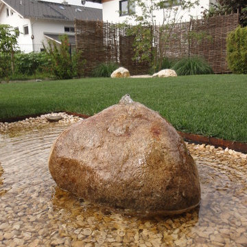Sprudelstein im Wasserbecken