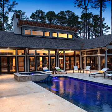 Rice Hope Elevated Spa Spilling into Elegant Pool
