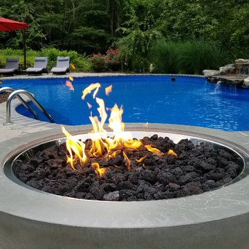 Vinyl pool with Waterfall, Landscape Lighting and Landscaping