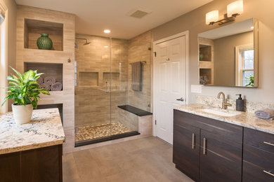 Mid-sized master beige tile ceramic tile, beige floor and single-sink wet room photo in Philadelphia with flat-panel cabinets, dark wood cabinets, a two-piece toilet, beige walls, a drop-in sink, granite countertops, a hinged shower door and multicolored countertops