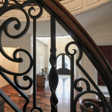 Project #74 | Circular Staircase with Hand-Forged Metal Panels