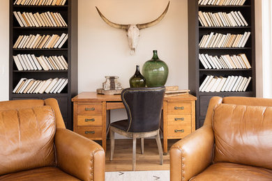 Example of a mid-sized trendy freestanding desk study room design in Other