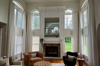 Example of a huge trendy living room design in New York