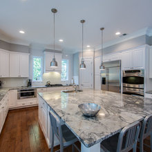 Windows on either side of stovetop