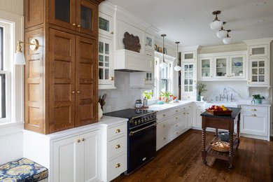 Eat-in kitchen - farmhouse l-shaped dark wood floor, brown floor and shiplap ceiling eat-in kitchen idea in Omaha with a farmhouse sink, recessed-panel cabinets, white cabinets, marble countertops and white countertops