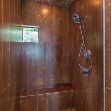 Master shower- wood-look ceramic tile- Lake Travis Waterfront Custom Home