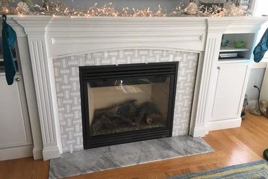 Living room - mid-sized transitional open concept light wood floor and beige floor living room idea in Bridgeport with gray walls, a standard fireplace, a tile fireplace and a wall-mounted tv