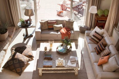 Living room - large country formal and open concept living room idea in Madrid with beige walls and a standard fireplace