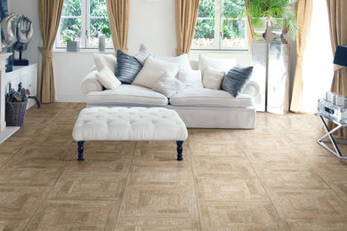 Inspiration for a mid-sized tropical formal and enclosed vinyl floor and beige floor living room remodel in San Diego with white walls, a standard fireplace, a wood fireplace surround and no tv