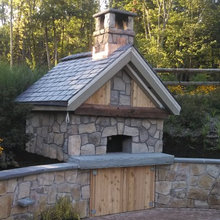 Outdoor Kitchen With Wood Fired Pizza Oven Gas Grill