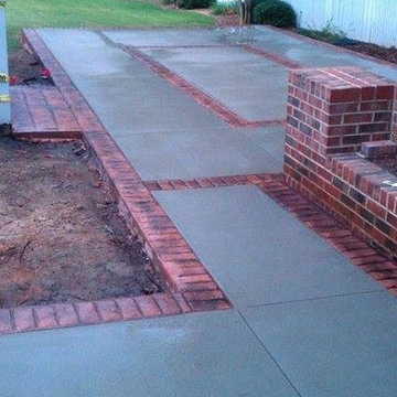 Stamped concrete brick border