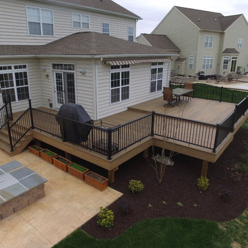 Timbertech legacy deck with aluminum rails with lighted post caps.