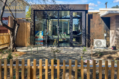 Example of a mountain style home office design in Other