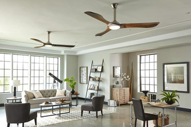 Example of a mid-sized transitional formal and open concept concrete floor living room design in Los Angeles with gray walls