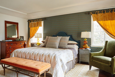 Eclectic master medium tone wood floor bedroom photo in Los Angeles with white walls
