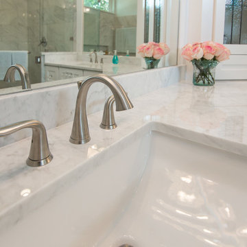 Bathroom | Elegant Custom Cabinets | Marble Tile & Freestanding Tub