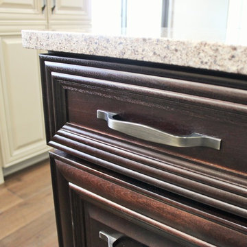 Farmhouse kitchen Taupe Painted Cabinets,Quartz Tops, and Dark Island