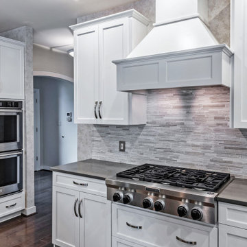 Contrasting White and Dark Gray Cabinets and Countertops in Crownsville, MD