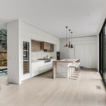 Sleek Modern Luxury Home Renovation with High-End Finishes and Contemporary Open