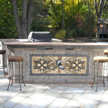 Outdoor Living Area with Kitchen and Pond