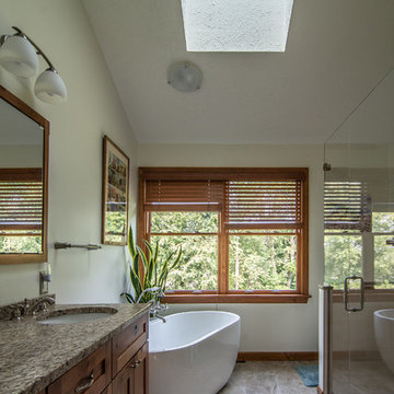 Master bath featuring a rustic character cherry vanity cabinet