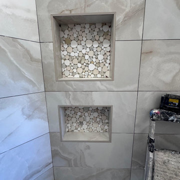 Curd-less walk-in shower; heated floors in bathroom + shower+bench LED