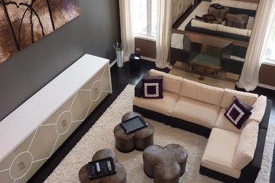 Family room - huge modern open concept dark wood floor family room idea in Chicago with gray walls, a ribbon fireplace, a metal fireplace and a concealed tv