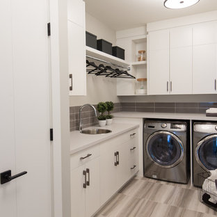 Hauswirtschaftsraum mit Waschmaschinenschrank und Waschbecken Ideen