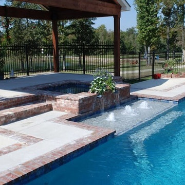 Classic gunite pool with antique brick coping
